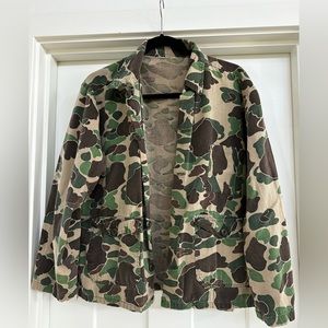 Vintage camo button down shirt fits like a men’s small.